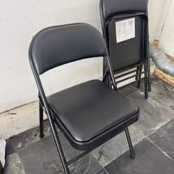 Two Padded Folding Chairs 