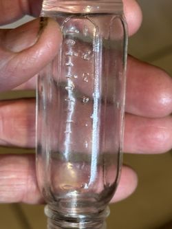 Antique Medicine Bottle Marked on The Bottom