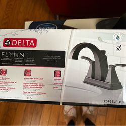 2 black delta Flynn faucets