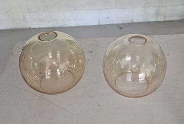 Amber glass globe pendant lights