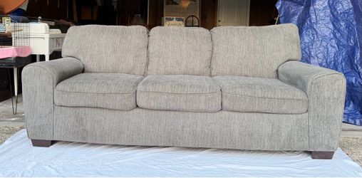 Comfortable sofa couch with neutral grey color. CAN DELIVER!