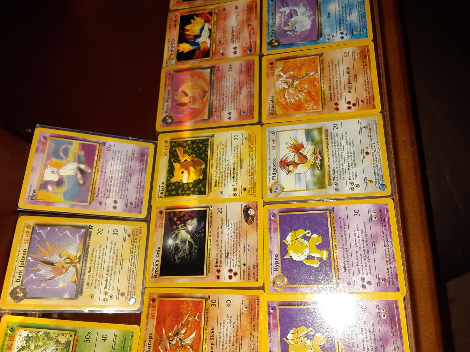 Pokemon cards!!! Some of the holographic type 1st gen fossils very nice collection.
