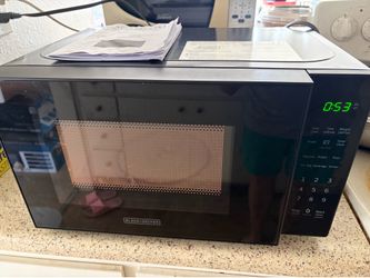 Used BLACK+DECKER 0.7 cu. ft. Countertop Microwave