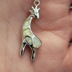 925 Silver Neklace With A White Opal Giraff On It. Has A Stainless Steel Rope Chain On It.
