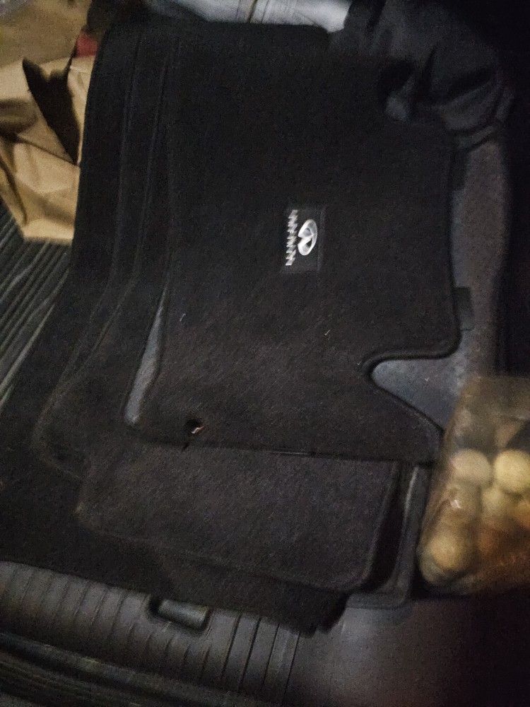 Brand New QX56 Floor Mats. (NEVER USED)