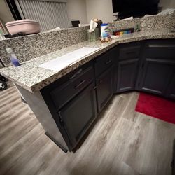 Custom Granite Wet Bar + 6 Ashley Swivel Bar Stools