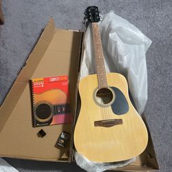 Rogue Acoustic Guitar With Lesson Book And Tuner