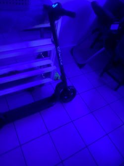 Electric scooter for sale with a charger