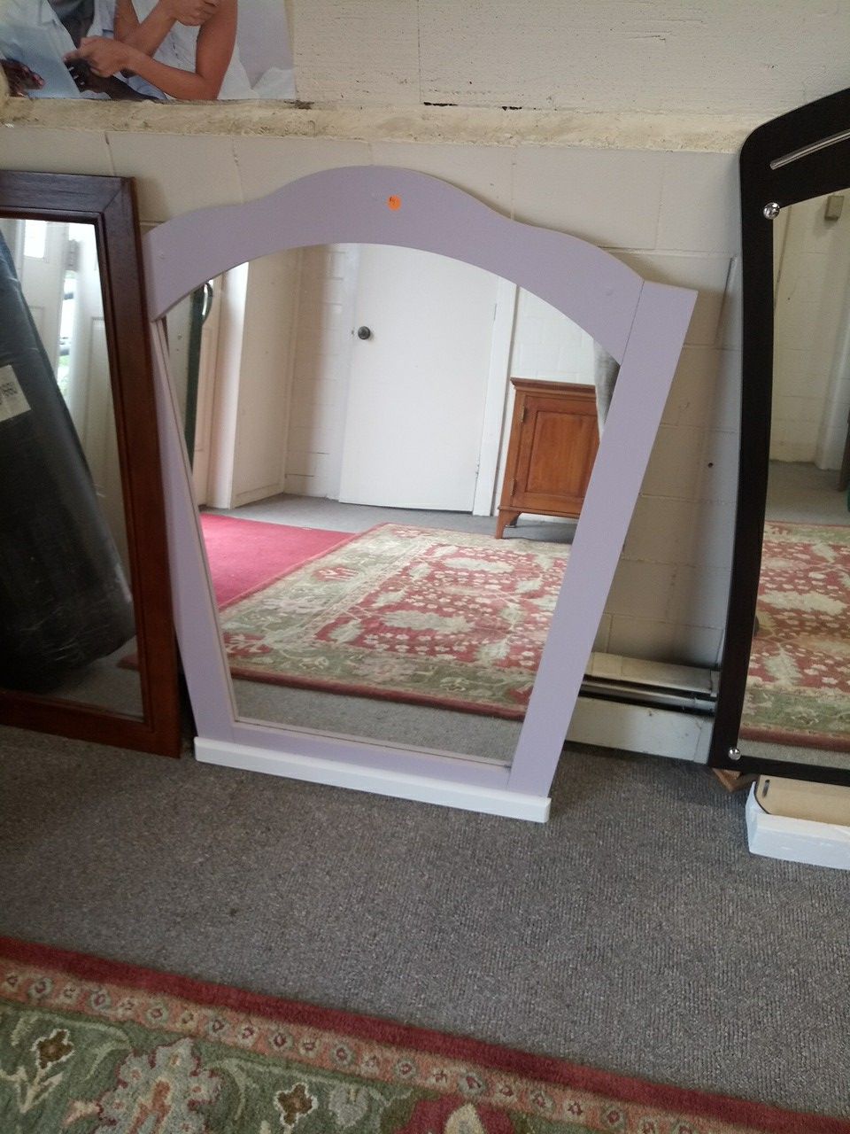 Wall or dresser mirror.