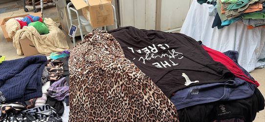 Black trash bag of plus size women’s clothes 2x-4x