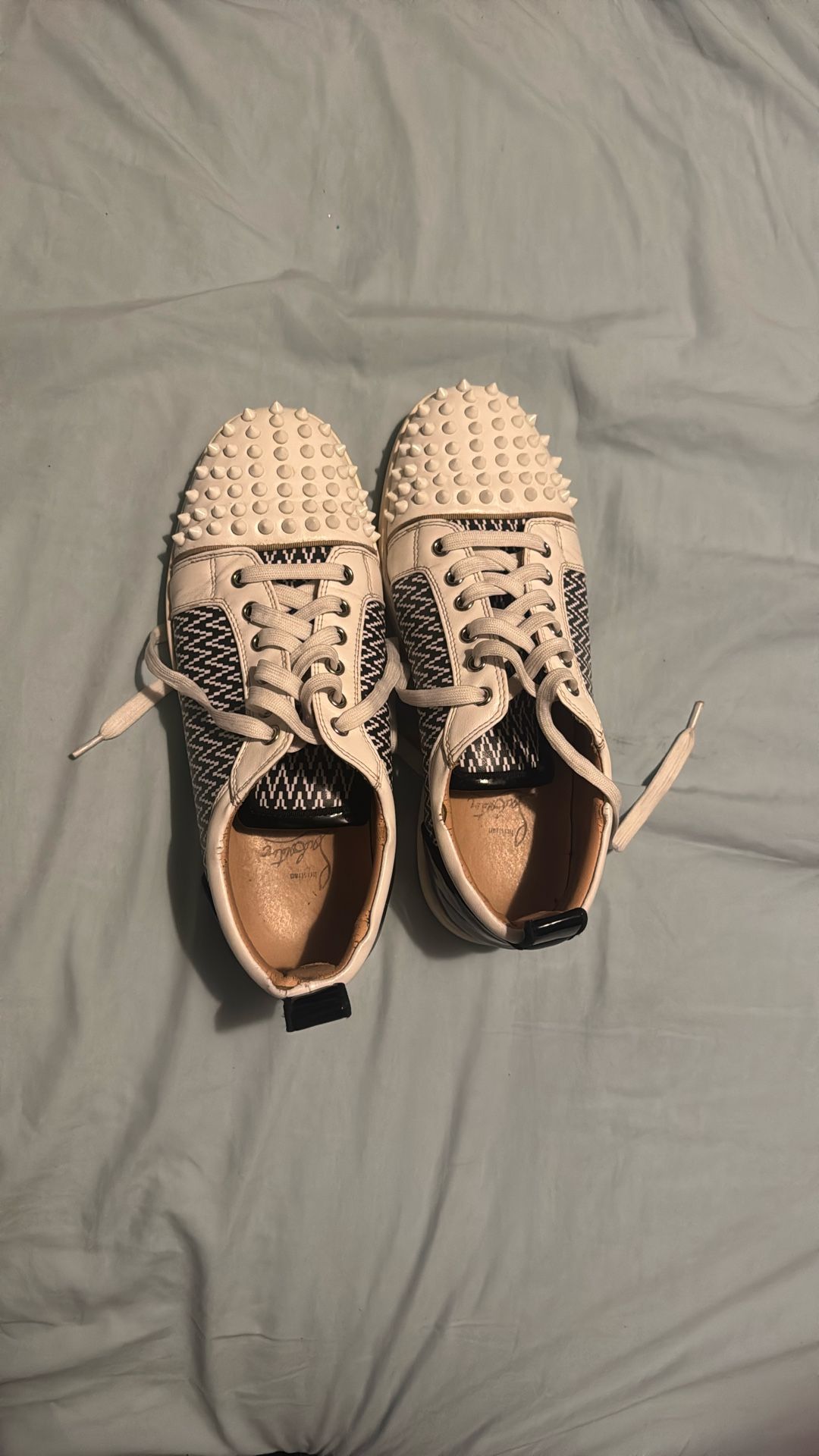 Beat Up Christian Louboutin Red Bottoms