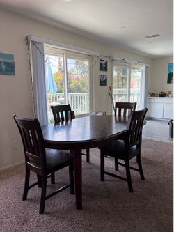 Large dining table with 5 chairs