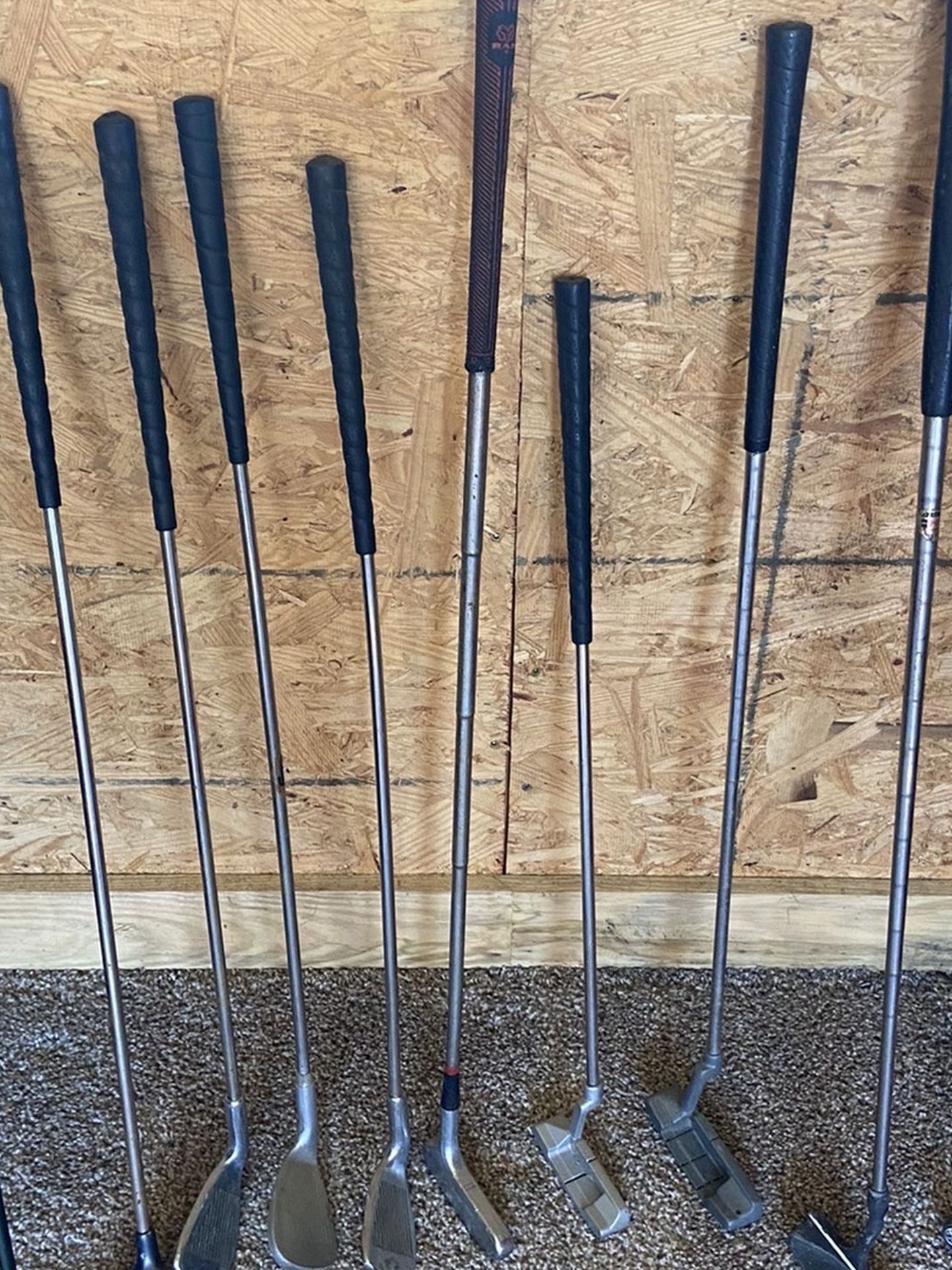 Assortment of golf clubs