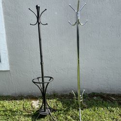 2 Vintage Coat Racks (Chrome 70”H And Black 69”H) In Good Condition $20 Each Firm On Price 