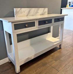 Real marble and heavy. Modern entry way table. Can deliver.