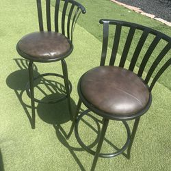 TWO BROWN STOOLS
