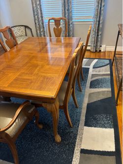 Wood dining table and chairs with leaf
