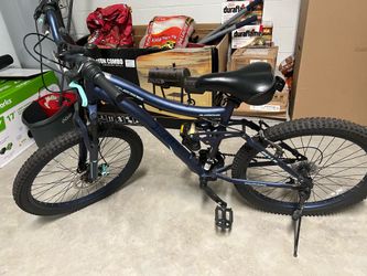 mountain bike genesis 24"bella light blue with aluminum with air pump and trunk mounted strap rack