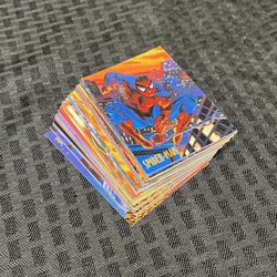 Lot of 49 1997 Fleer Skybox Marvel Spider-Man International Trading Cards