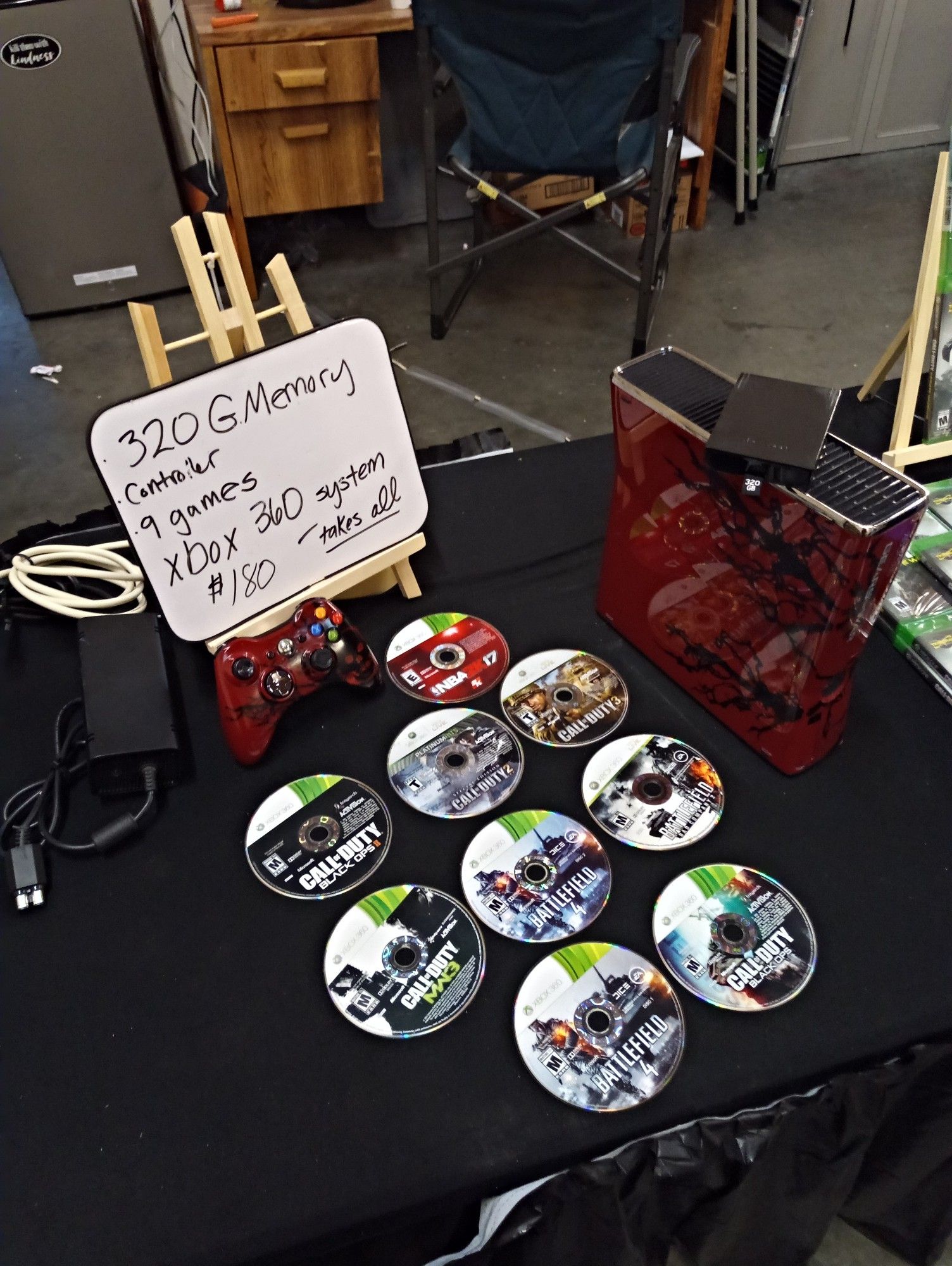 LIKE NEW STILL !! HARDLY EVER USED IT !! XBOX 360 "GEARS OF WAR EDITION" WITH A 320 GB AND 9 GAMES . CONTROLLER AND PLUGS