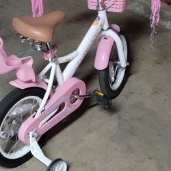 Little Girls , Beginners Bikes Like New . Has Baby Doll Seat Attachment  40 Each