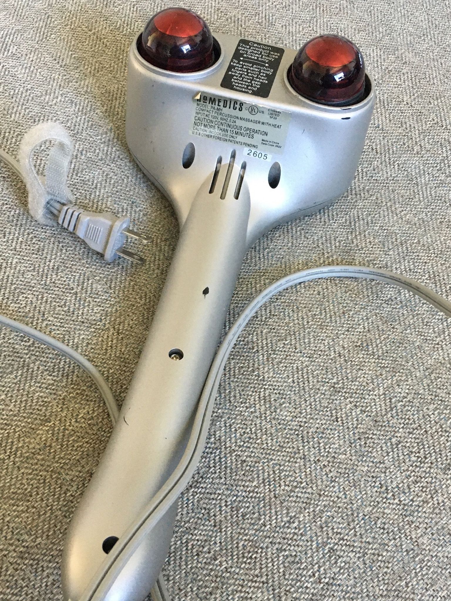 HAND-HELD MASSAGER