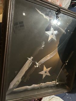 Filipino swords in  wood and glass wall  display