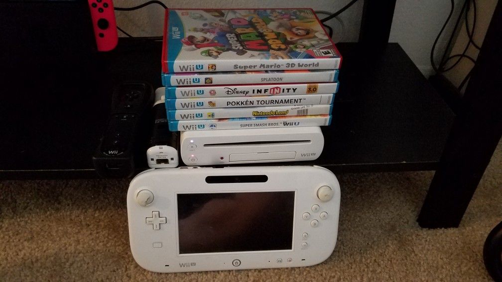 Wii u console with games willing to trade for Xbox one
