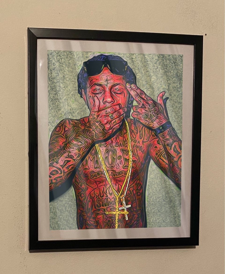 Art piece of lil Wayne on black frame
