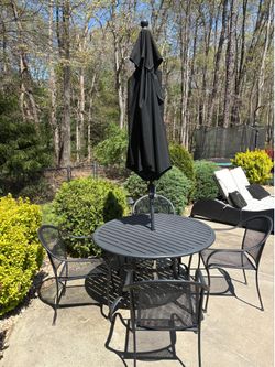 Outdoor round table, 4 chairs and umbrella set