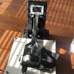 1 large and 1 small T shirt presser