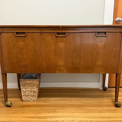 MCM Vintage Mount Airy Janus Walnut Sideboard retails for $3,000