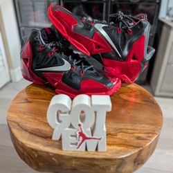 Size 10 Men's 
Nike LeBron 11 Away 
616175-001
Red/Black  (2013)

