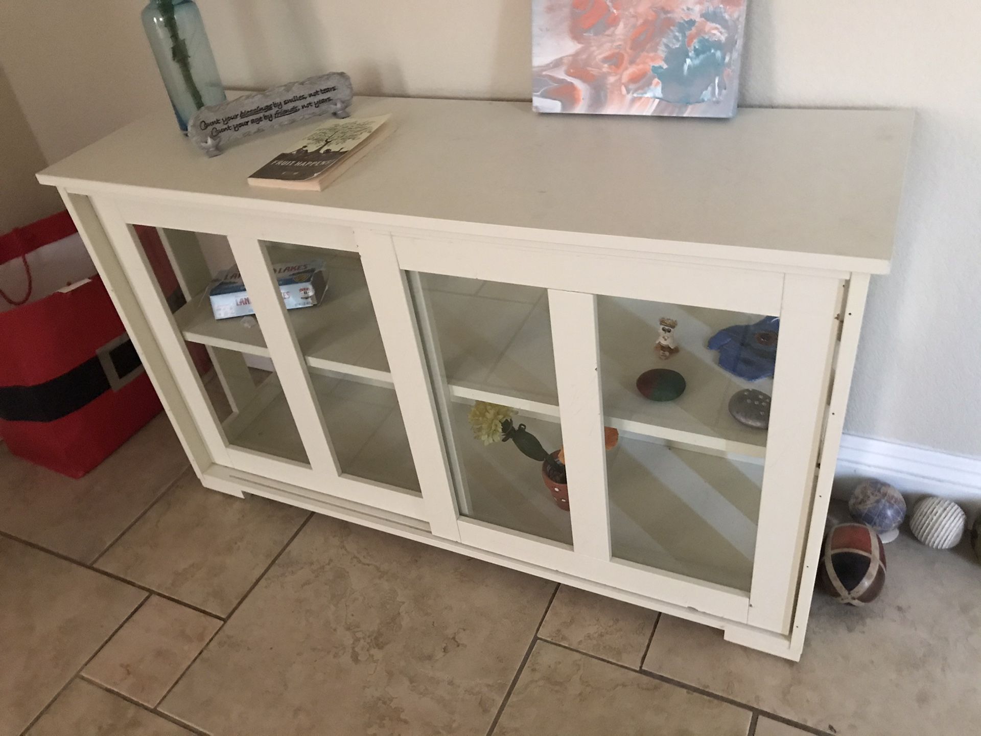 White shelve with glass doors