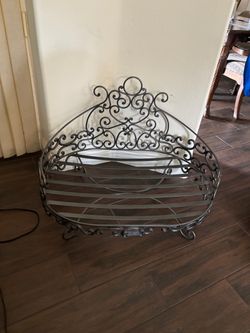 Dog bed large wrought iron material heavy 36” wide 24” deep In excellent condition