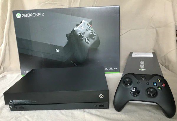 Xbox One X with 2 Games