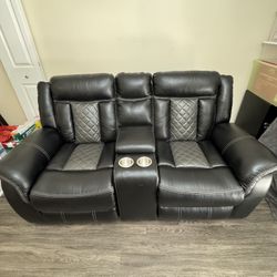 Double leather reclining sofa with cup holder