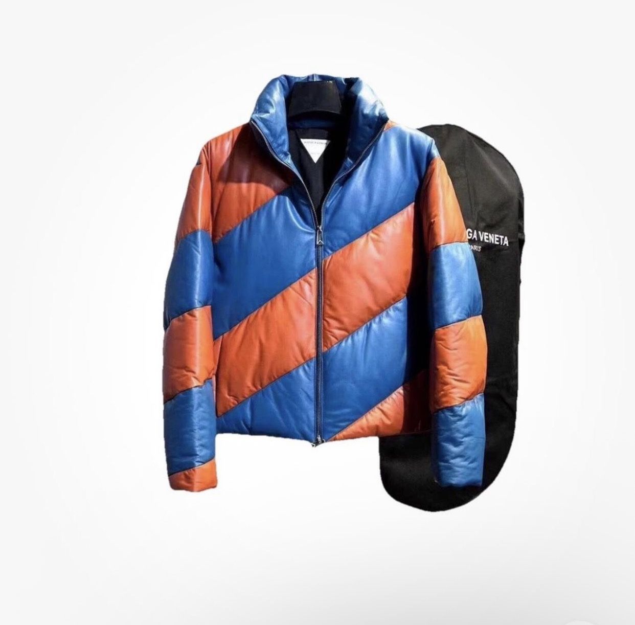 Orange and blue striped leather BOTTEGA VENETA puffer jacket. Elasticated hem. Zip closure. Silver-tone hardware. Black polyester lining. Made in It