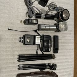 Canon Sure Shot 35mm Camera, Flashes, Tripods And Equipment