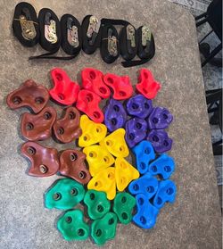 Climbing holds with straps