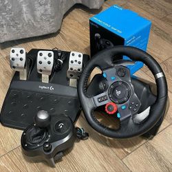 a Logitech steering wheel G29 + 3-pedal set +  6-speed shifter.