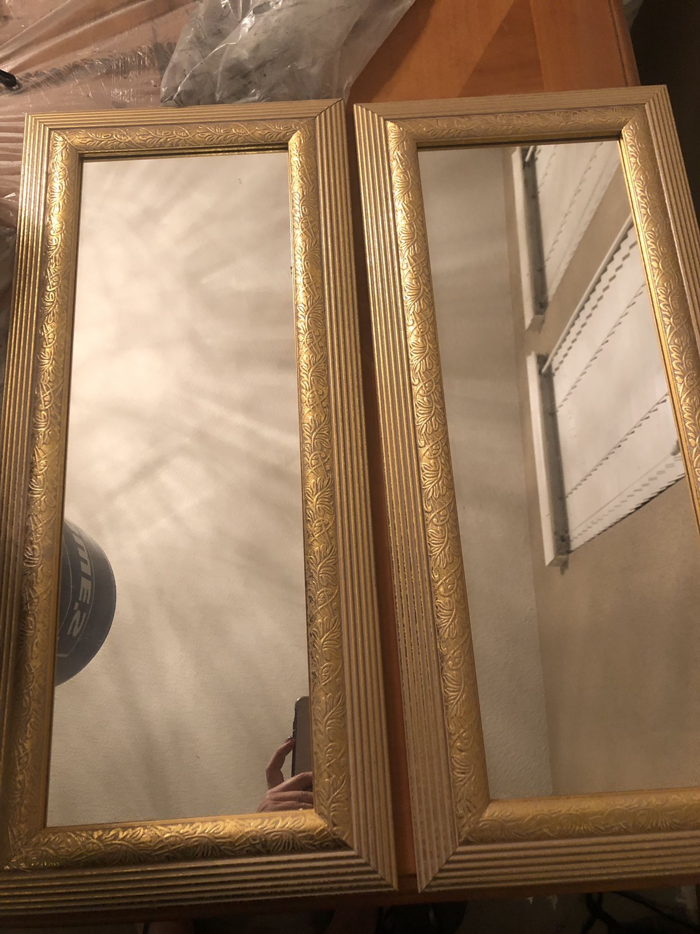 2 gold mirrors