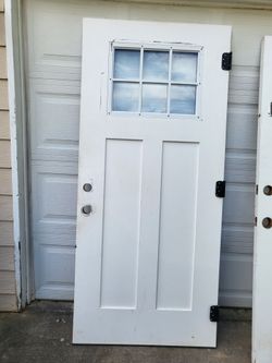 Solid wooden exterior door in great condition  Left hand swing in.
