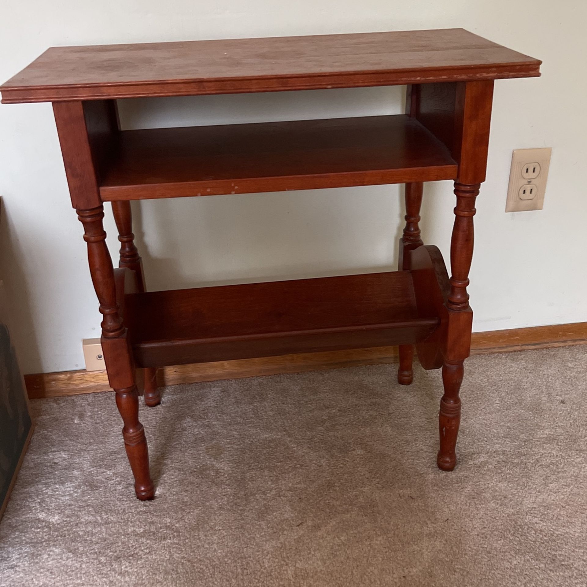 Side table with magazine storage
