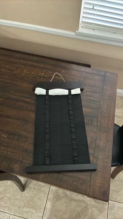 Martial arts belt holder
