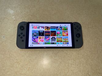 Nintendo Switch OLED with 125 Switch Games Installed