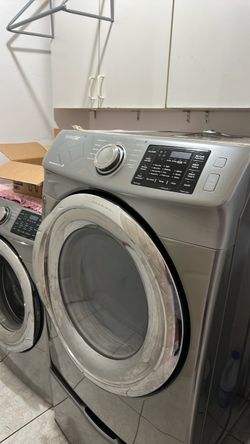 Wash and dry laundry Samsung
