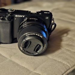 Sony a6000 with 16-50 lens & Nex3 with flash, 3 batteries charger and power adapter