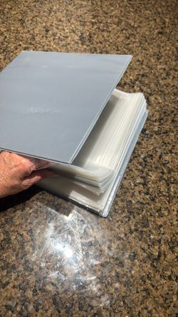 Binder full of sheet protectors