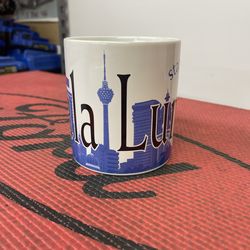 Starbucks Kuala Lumpur City Mug from the Collector Series, originally released around 2001-2006. It is a ceramic mug featuring skyline graphics of the